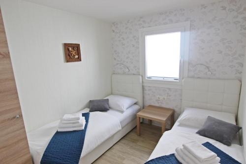 Vegros Mobile Homes Slanica客房内的一张或多张床位