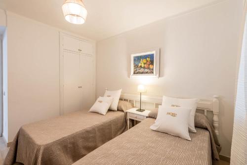 罗斯公寓式酒店客房内的一张或多张床位