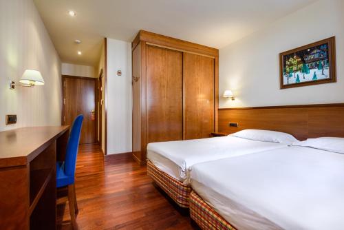 坎丹丘酒店客房内的一张或多张床位