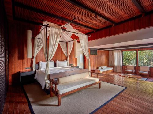 Taj Exotica Resort & Spa, Andamans客房内的一张或多张床位