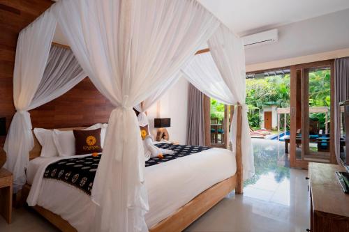 Freddies Villas Ubud Bali客房内的一张或多张床位