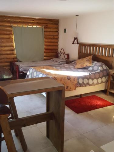 卡瓦尼亚斯廊奎兰开山林小屋客房内的一张或多张床位