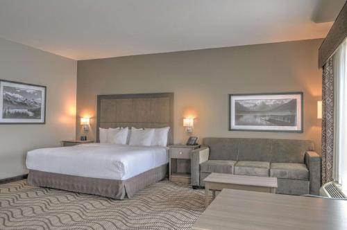 卡利斯佩尔拉奎塔酒店及套房客房内的一张或多张床位