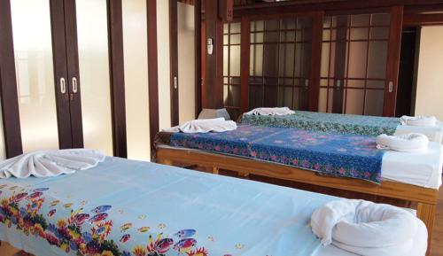 Pavilion Samui Villas and Resort - SHA Extra Plus客房内的一张或多张床位