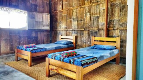婆罗洲部族村（BTV）山林小屋客房内的一张或多张床位
