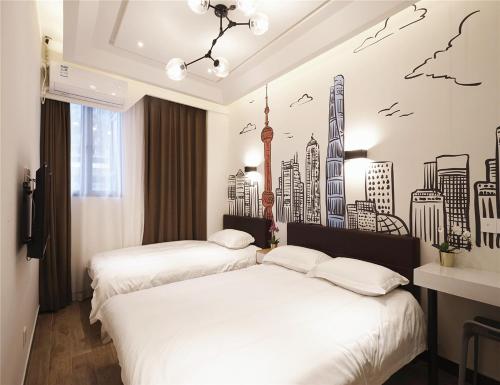 上海meego米果悦思酒店客房内的一张或多张床位