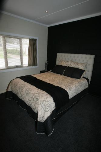 Kindred Lodge Apartments客房内的一张或多张床位