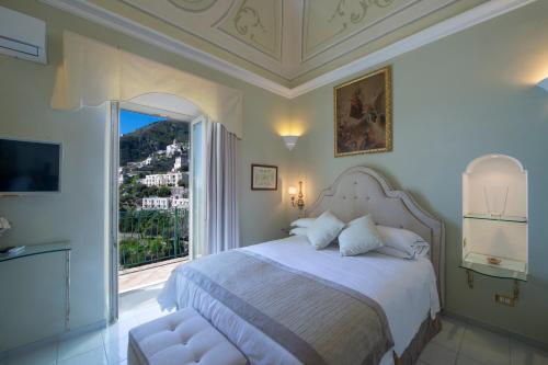 Villa Lauro Old Chapel客房内的一张或多张床位