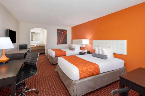 石山豪生国际酒店集团客房内的一张或多张床位