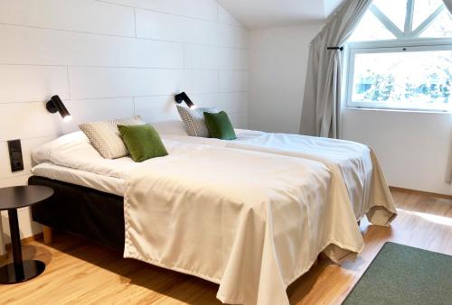 HeseHotelli Turku Kaskentie客房内的一张或多张床位