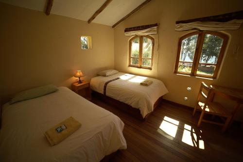科帕卡巴纳生态旅馆客房内的一张或多张床位