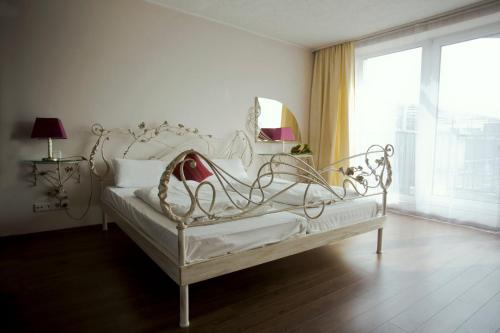 圣彼得堡公寓酒店客房内的一张或多张床位