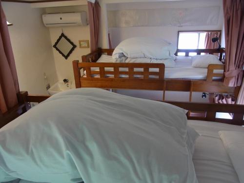 田村旅馆客房内的一张或多张床位