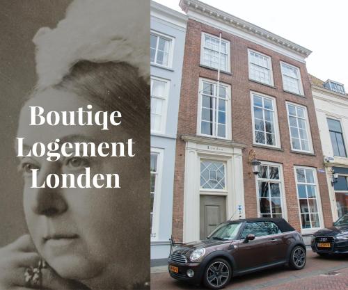 米德尔堡Boutique Logement Londen Centrum Middelburg的停在大楼前的一张汽车照片