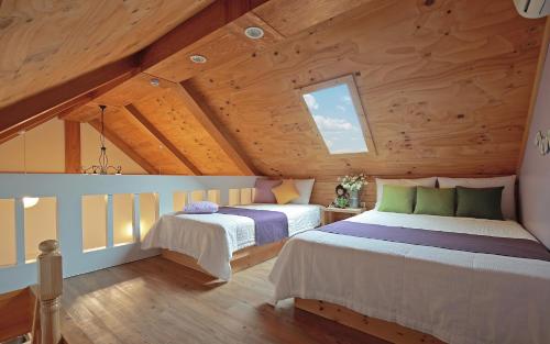 庆州提阿莫度假屋客房内的一张或多张床位