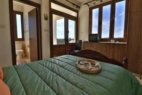 Samareitidos Light Cottage客房内的一张或多张床位