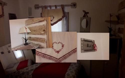 布齐耶比利牛斯2000Ker Capcir的一间卧室配有一张心形床和镜子