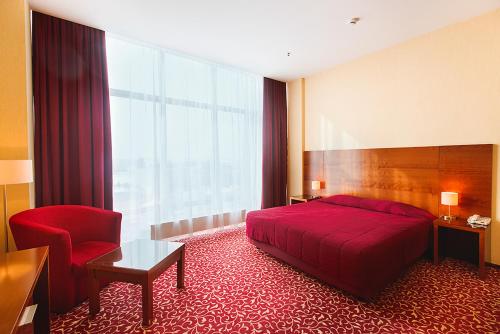 喀山大酒店客房内的一张或多张床位