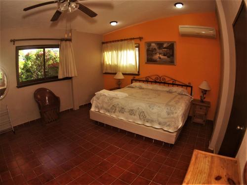 Quinta Comala Hotel & Villas客房内的一张或多张床位