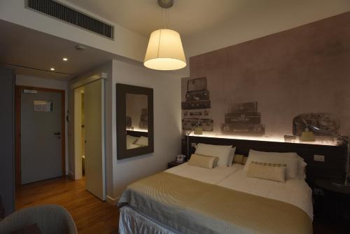 Hotel La Vigna客房内的一张或多张床位