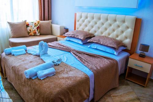 Hotel Ajana客房内的一张或多张床位