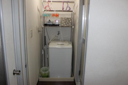 マンションロアジス 大阪市東淀川区相川的一间浴室
