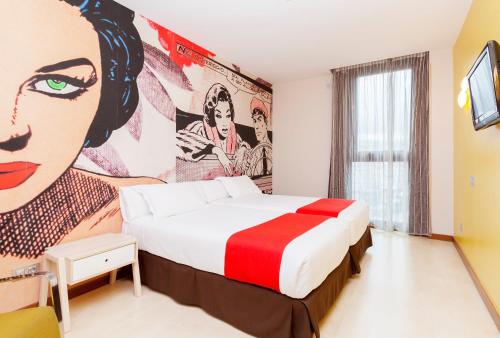Hotel Gran Bilbao客房内的一张或多张床位