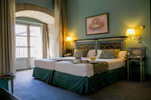 洛维拉达宫酒店客房内的一张或多张床位