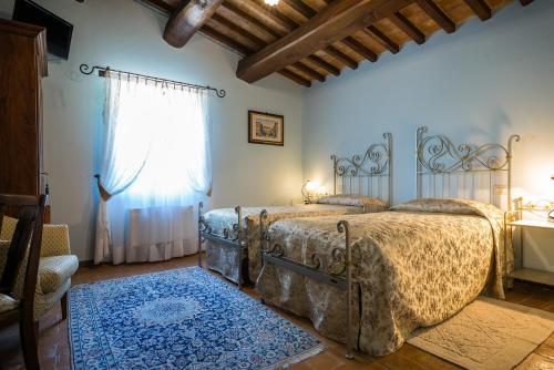 Hotel & SPA L'Antico Forziere客房内的一张或多张床位
