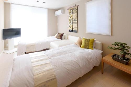 Libre Hosai Stay Kanazawa - Vacation STAY 3359客房内的一张或多张床位