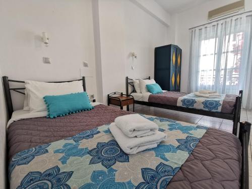 爱琴海酒店客房内的一张或多张床位