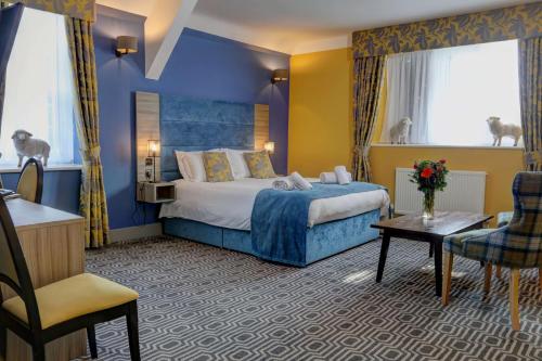 Stonecross Manor Hotel客房内的一张或多张床位