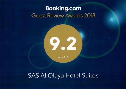 阿可贺巴SAS Al Olaya Hotel Suites的一张海报,供游客在索求评奖奥达酒店时评审