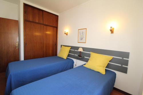 ApartamentoSolPraia - BeloHorizonte客房内的一张或多张床位