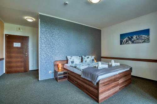 阿瓦兰奇酒店客房内的一张或多张床位