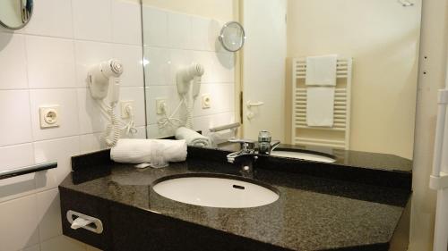 大博斯特尔区加尼入口酒店的一间浴室