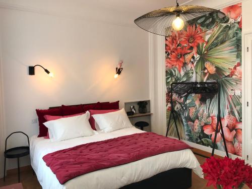 Les Floralies Capucines客房内的一张或多张床位