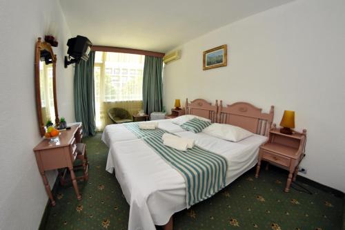 Hotel Miorita Neptun客房内的一张或多张床位