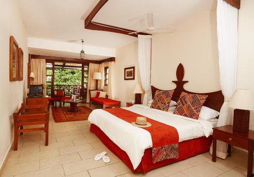海王星海滩度假村 - 全包酒店客房内的一张或多张床位