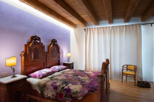 Relais SANT'AMBROGIO客房内的一张或多张床位