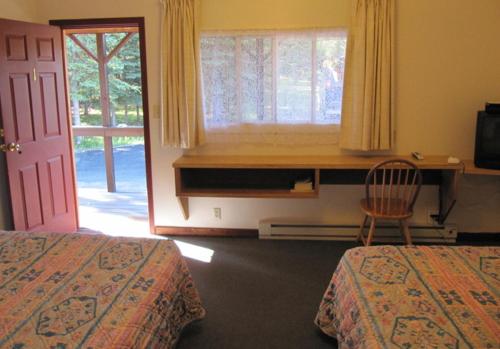 White Moose Lodge客房内的一张或多张床位
