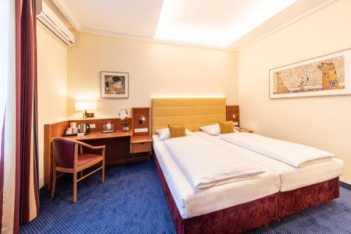 奥地利维也纳经典酒店客房内的一张或多张床位