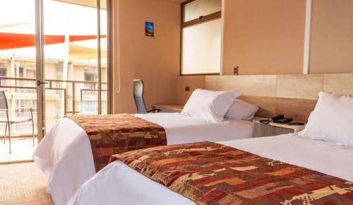 Hotel Vento客房内的一张或多张床位