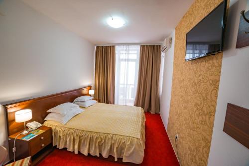 圣巴尼亚卢卡拉克塔奇酒店客房内的一张或多张床位