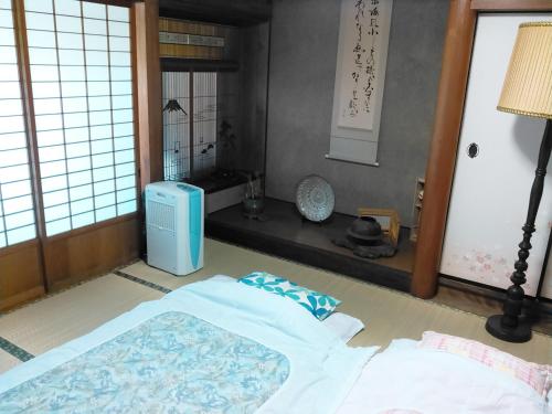 昭和の宿 汐凪 shionagi客房内的一张或多张床位