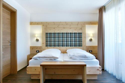 加尼拉特兰奎利戴酒店客房内的一张或多张床位