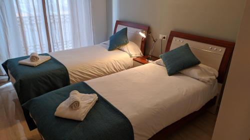 阿拉米达科隆生活公寓客房内的一张或多张床位