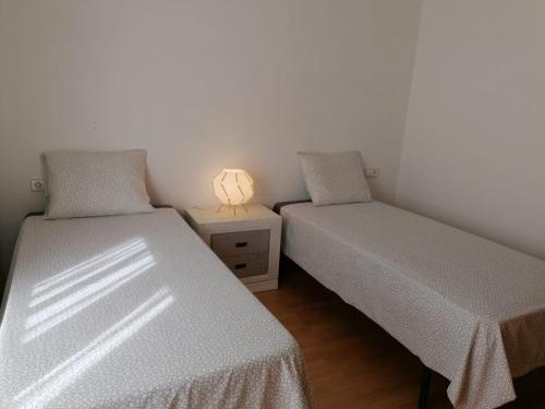 Apartamento Serreria de Boltaña客房内的一张或多张床位