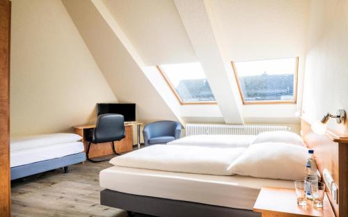 Schroeders City-Style-Hotel客房内的一张或多张床位