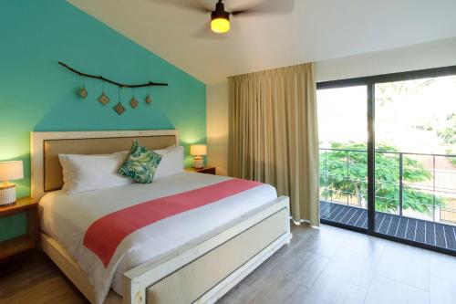 San Trópico Boutique Hotel & Peaceful Escape客房内的一张或多张床位